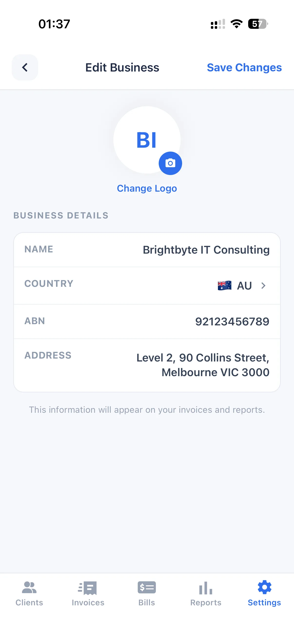 InvoiceMate business settings screen showing business name, ABN, GST settings and payment details